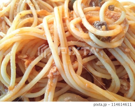 long pasta spaghetti with tuna sauce, anchovies and Taggiasca olives long pasta spaghetti with tuna sauce, anchovies and Taggiasca olives 114614611