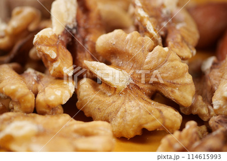 walnut on a plate on table walnut on a plate on table 114615993