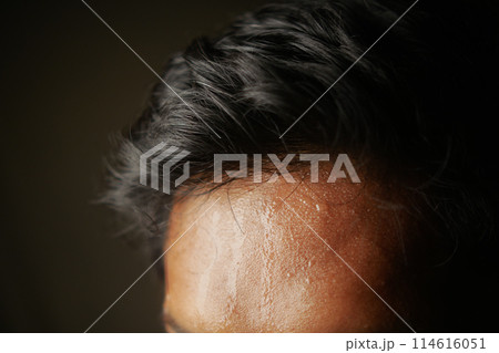 closeup of sweat on forehead against dark background , closeup of sweat on forehead against dark background , 114616051