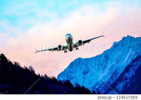 passenger plane flies over the mountains. air transport industry passenger plane flies over the mountains. air transport industry 114617369