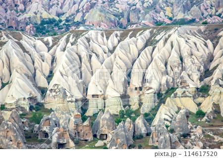 Volcanic rocks and limestone cliffs in Cappadocia valley. Turkey 114617520