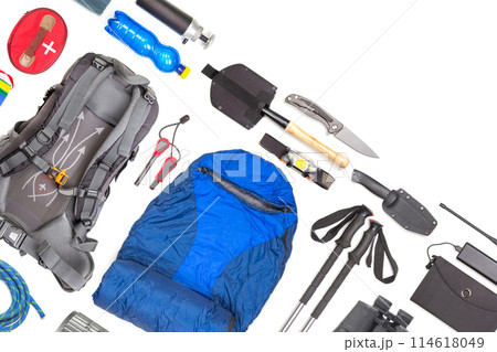 Set of tourist trekking items on white background. Top view of accessories for travel. Set of tourist trekking items on white background. Top view of accessories for travel. 114618049