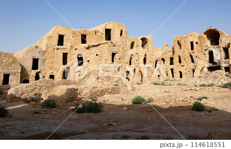 Uninhabited fortified village with houses and granaries, Tunisia. Ksar of Mgabla, Berber, Tataouine. Uninhabited fortified village with houses and granaries, Tunisia. Ksar of Mgabla, Berber, Tataouine. 114618551