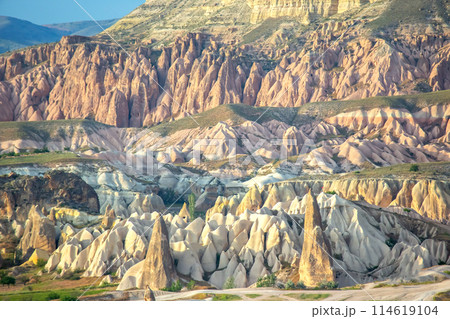 Volcanic rocks and limestone cliffs in Cappadocia valley. Turkey. 114619104
