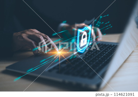 Businessmen protect personal data information from viruses on a laptop with virtual screen interfaces. Cyber security and privacy protection network security computer and safe data concept. 114621091