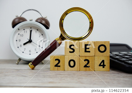 SEO 2024 with wooden blocks alphabet letters and Magnifying glass on wooden background SEO 2024 with wooden blocks alphabet letters and Magnifying glass on wooden background 114622354