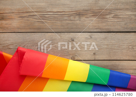Rainbow LGBT flag on grey wooden background with copy space Rainbow LGBT flag on grey wooden background with copy space 114625780