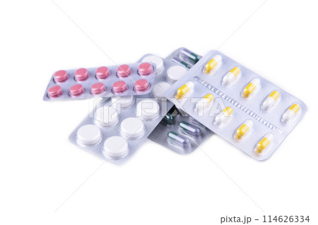 White pills in blister isolated on white background White pills in blister isolated on white background 114626334
