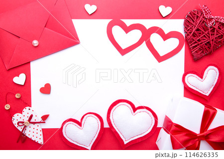 Valentine's day background with decoration on red background. Valentine's day background with decoration on red background. 114626335