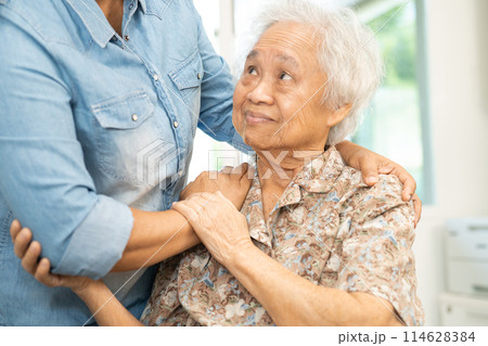 Caregiver help and care Asian senior woman patient with love, encourage and empathy in hospital. Caregiver help and care Asian senior woman patient with love, encourage and empathy in hospital. 114628384