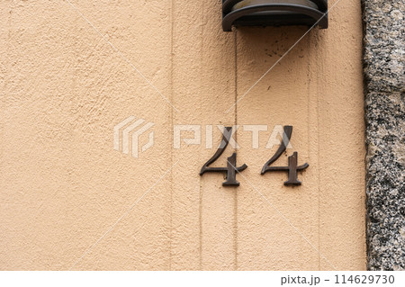 the number 44 is on the side of a building the number 44 is on the side of a building 114629730