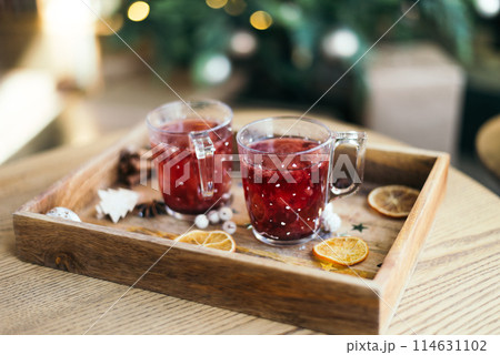 Christmas sweets and tea cups, festive composition. Christmas decor on wooden table background. Christmas and new year holiday concept. atmosphere tradition christmas image 114631102