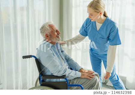 Help support retirement healthcare. Nurse helping old man in wheelchair. Patient and woman in nursing home for medical caregiver. Nurse taking care of paralyzed man in chair for people with disability 114632398