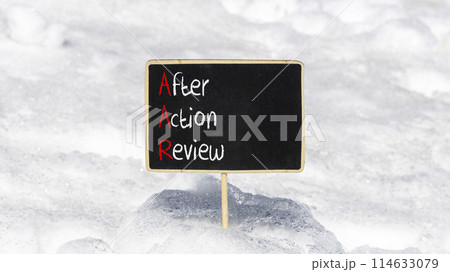AAR After action review symbol. Concept words AAR After action review on beautiful yellow blackboard. Beautiful white snow background. Business AAR after action review concept. Copy space. 114633079