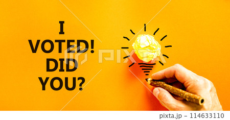 I voted. Did you symbol. Concept words I voted. Did you on beautiful orange paper. Beautiful orange background. Businessman hand. Business I voted. Did you concept. Copy space. 114633110