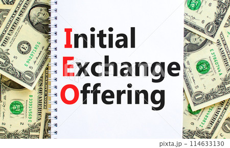 IEO initial exchange offering symbol. Concept words IEO initial exchange offering on beautiful note. Beautiful dollar bills background. Business IEO initial exchange offering concept. Copy space. 114633130