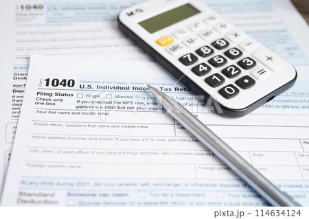 Tax form 1040 U.S. Individual Income Tax Return, business finance concept. Tax form 1040 U.S. Individual Income Tax Return, business finance concept. 114634124