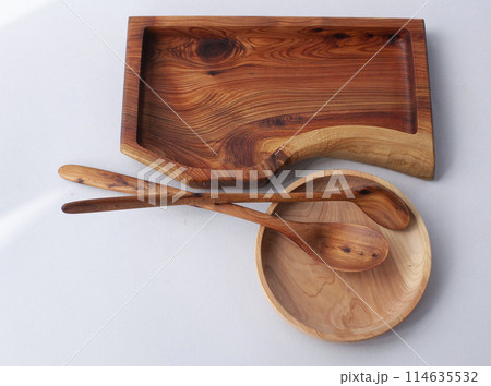 Wooden kitchen utensils stacked view, spoon and spatula close up Wooden kitchen utensils stacked view, spoon and spatula close up 114635532