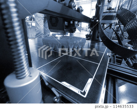 3D printer printing object close-up. Process creating three-dimensional model on 3d printer. Additive printer technology. 3D Prototyping. 3D design modeling. New modern innovation printing technology 114635533