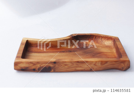 Wooden kitchen utensils stacked view, spoon and spatula close up 114635581