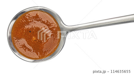 Beef stew sauce in spoon isolated on white background, top view 114635655