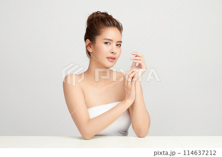 Beautiful young asian woman with clean fresh skin on white background, Face care, Facial treatment, Cosmetology, beauty and spa, Asian women portrait. Beautiful young asian woman with clean fresh skin on white background, Face care, Facial treatment, Cosmetology, beauty and spa, Asian women portrait. 114637212