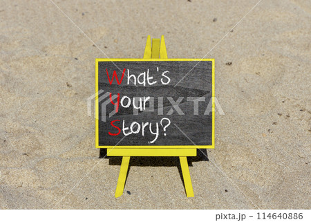 Storytelling and what is your story symbol. Concept words What is your story on beautiful yellow blackboard. Beautiful sand background. Business storytelling what is your story concept. Copy space 114640886