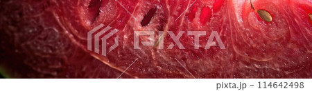Vibrant Watermelon Slice Close-up with Glistening Juice Droplets 114642498