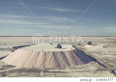 Trucks unloading raw salt bulk, Salinas Grandes de Hidalgo, La Pampa, Argentina. Trucks unloading raw salt bulk, Salinas Grandes de Hidalgo, La Pampa, Argentina. 114642777
