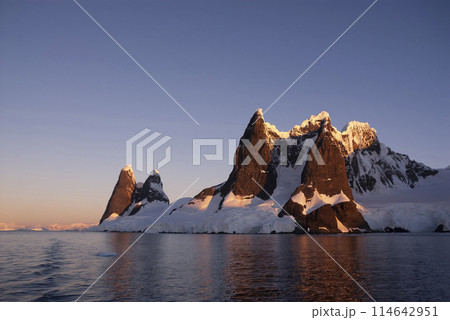 Lemaire strait coastal landscape, mountains and icebergs, Antarctic Peninsula, Antartica. 114642951