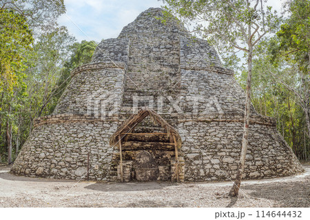 Coba, Mexico. Ancient mayan city in Mexico. Coba is an archaeological area and a famous landmark of Yucatan Peninsula. Cloudy sky over a pyramid in Mexico Coba, Mexico. Ancient mayan city in Mexico. Coba is an archaeological area and a famous landmark of Yucatan Peninsula. Cloudy sky over a pyramid in Mexico 114644432