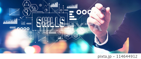 Skills theme with a businessman holding a marker 114644912