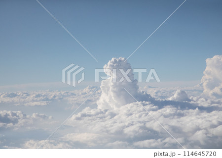 Sunrise above textured clouds from airplane window 114645720