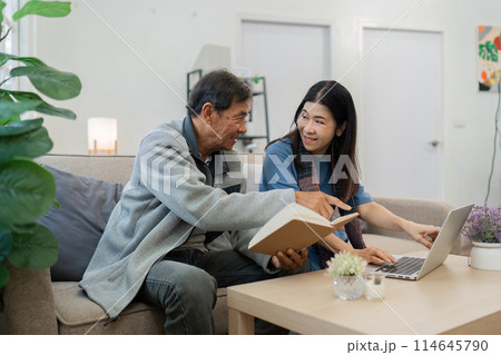 Senior happy couple smiling elderly family reading news, shopping online at home, older people and computer or good vision after laser correction concept Senior happy couple smiling elderly family reading news, shopping online at home, older people and computer or good vision after laser correction concept 114645790