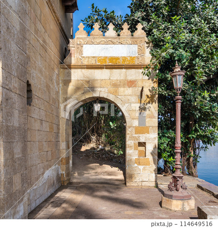 Sunlit Archway and Vintage Streetlamp by Riverside Sunlit Archway and Vintage Streetlamp by Riverside 114649516
