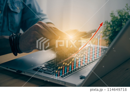 Casual Businessman Touch Smart Phone or Mobile Phone and Color Stock Bar Graph in Vintage Tone Casual Businessman Touch Smart Phone or Mobile Phone and Color Stock Bar Graph in Vintage Tone 114649718