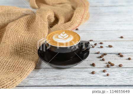 Cappuccino is a classic Italian coffee beverage consisting of equal parts espresso, steamed milk, and milk foam 114655649