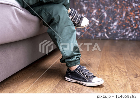casual comfortable children's clothing. pants and sneakers 114659265