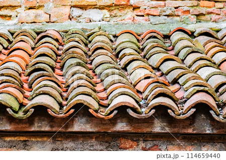 close up of weathered clay roof tiles close up of weathered clay roof tiles 114659440