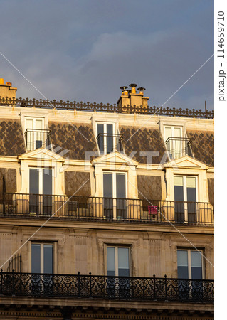 classic parisian rooftop with dormer windows and chimneys classic parisian rooftop with dormer windows and chimneys 114659710