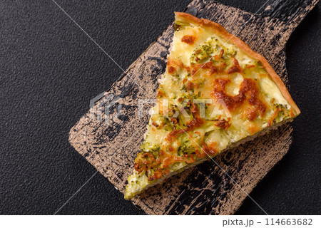 Delicious quiche with broccoli, cheese, chicken, spices and herbs 114663682