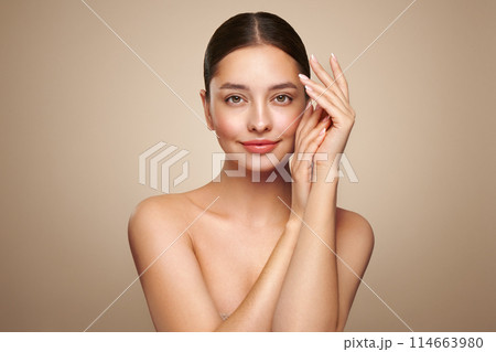 Young woman doing scrapping massage facial skin Young woman doing scrapping massage facial skin 114663980
