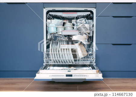 Dishwasher in modern blue kitchen Dishwasher in modern blue kitchen 114667130