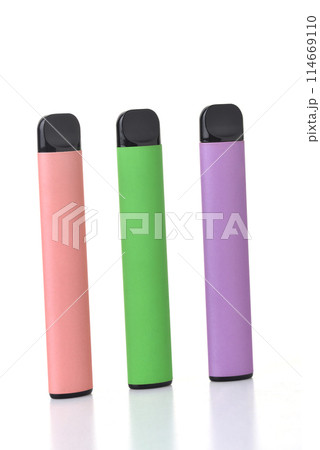 Colorful disposable electronic cigarettes isolated on a white background. The concept of modern smoking, vaping and nicotine. Colorful disposable electronic cigarettes isolated on a white background. The concept of modern smoking, vaping and nicotine. 114669110