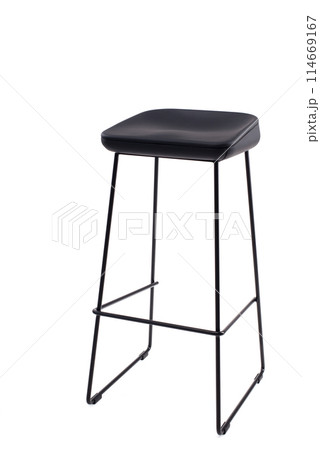 Steel frame high bar stool with a black seat. Loft style interior Steel frame high bar stool with a black seat. Loft style interior 114669167