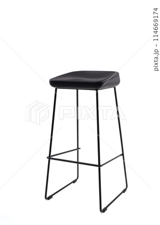 Steel frame high bar stool with a black seat. Loft style interior 114669174