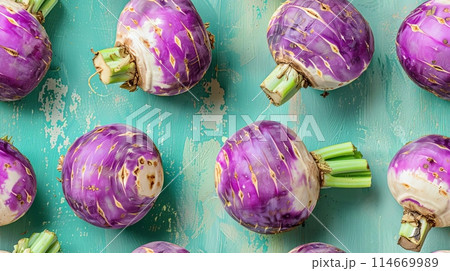 Fresh purple turnips on a turquoise wooden background, showcasing vibrant colors and healthy vegetables in a top view arrangement. Fresh purple turnips on a turquoise wooden background, showcasing vibrant colors and healthy vegetables in a top view arrangement. 114669989