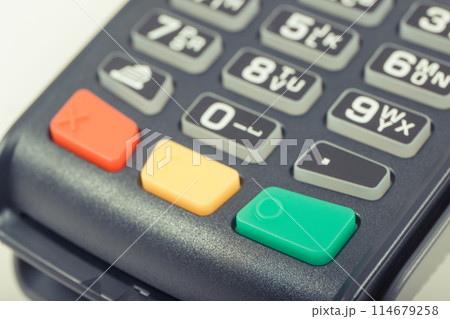Credit card reader as device using for cashless paying. Payment terminal. Finance concept Credit card reader as device using for cashless paying. Payment terminal. Finance concept 114679258