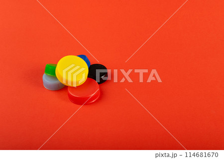 Plastic Bottle Caps Pile. Recycling HDPE Material Group, Circle Polyethylene Lid Set, Colorful Caps Group Plastic Bottle Caps Pile. Recycling HDPE Material Group, Circle Polyethylene Lid Set, Colorful Caps Group 114681670