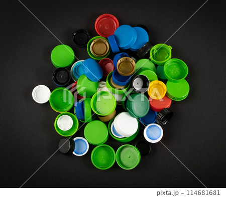 Plastic Bottle Caps Pile. Recycling HDPE Material Group, Circle Polyethylene Lid Set, Colorful Caps Group Plastic Bottle Caps Pile. Recycling HDPE Material Group, Circle Polyethylene Lid Set, Colorful Caps Group 114681681